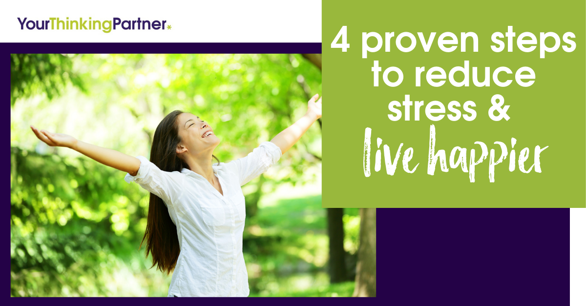 Happy woman with her arms stretched out wide and up because she's stress-free.